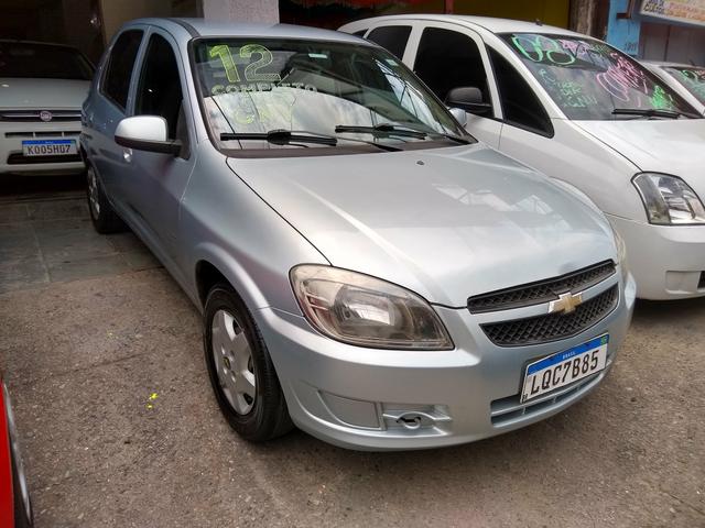 Gm/ Celta LT 1.0 Flex/GNV/completo/ 2012/ R$ 18.000,00