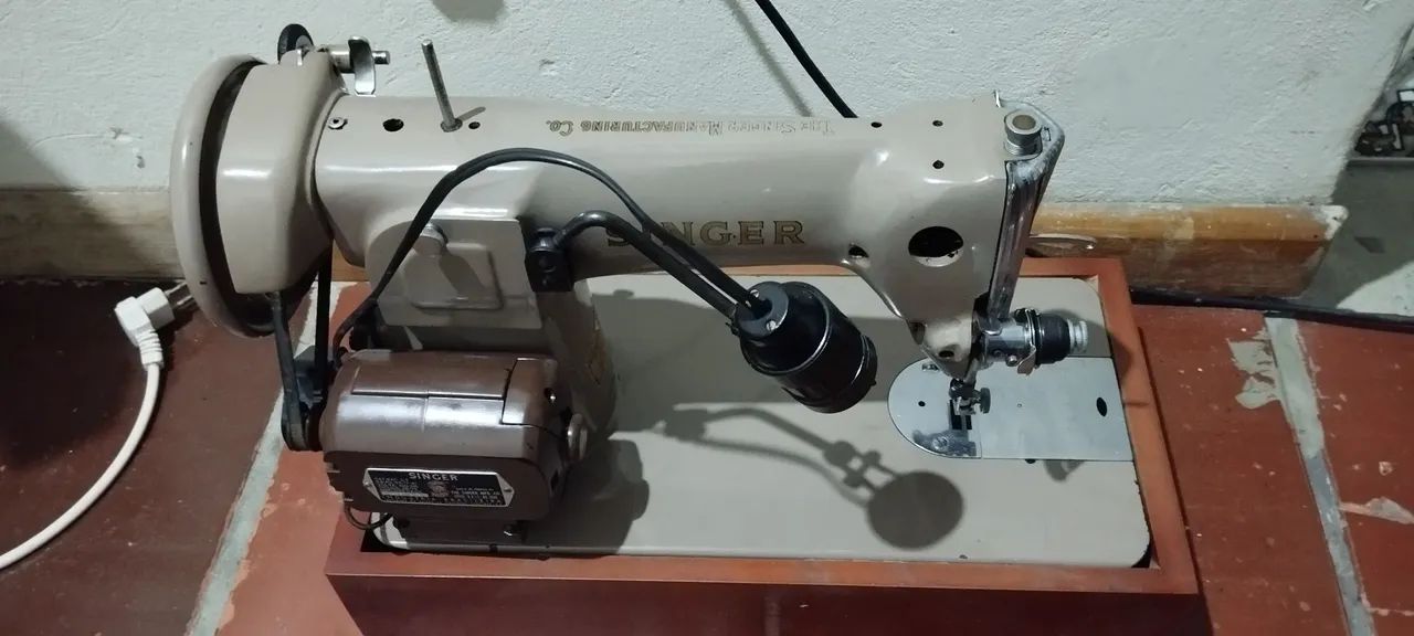 Máquina de costura singer 