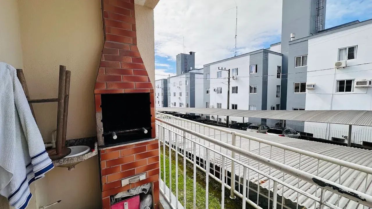 APARTAMENTO TERREO - 02 DORMITORIOS COM SACADA E GARAGEM COBERTA - Foto 4