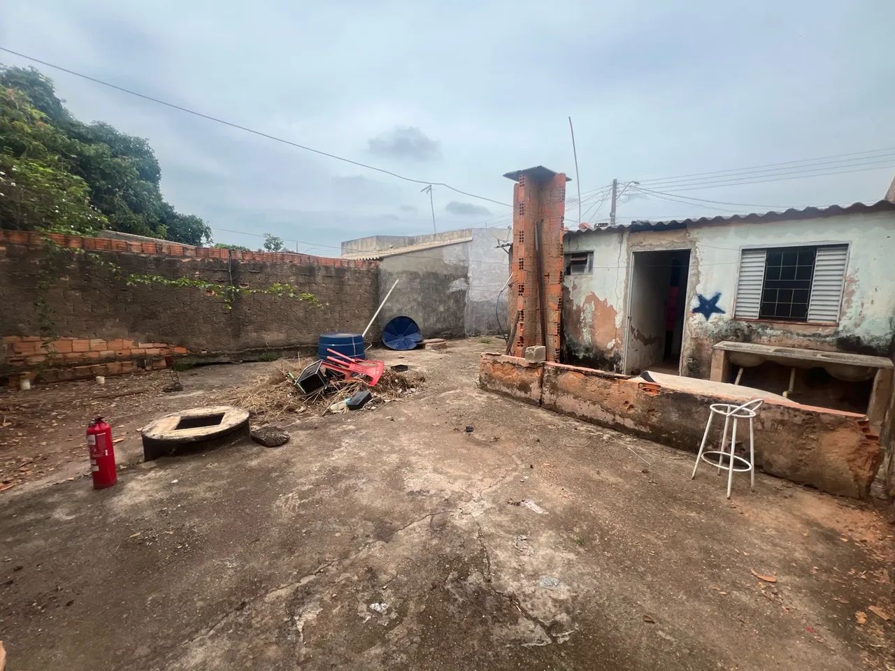 Terreno com casa 