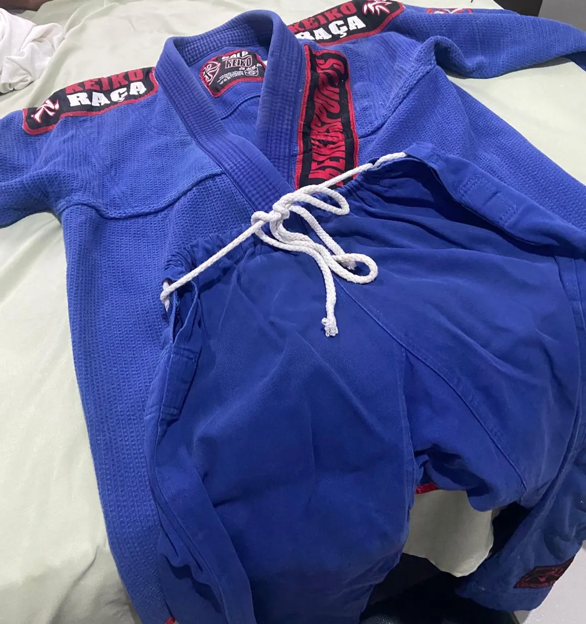 Kimono Jiu-Jitsu Keiko Raca Azul (acompanha faixa branca)