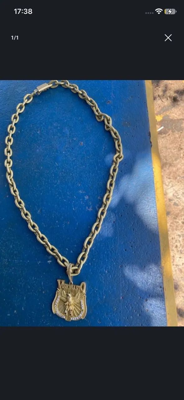 Moeda antiga com pingente visionário 