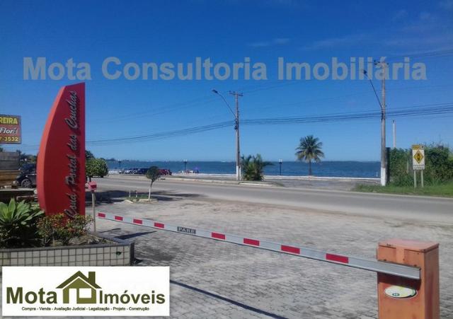 Mota Imóveis - Lindo Terreno 315m² Condomínio Alto Padrão - Praia do Barbudo - TE-112