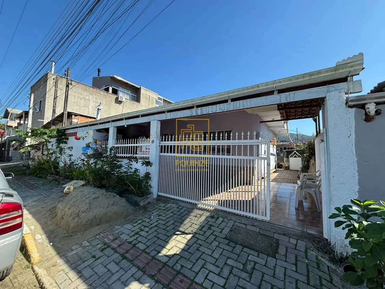 3 casas em um só terreno a poucos minutos da praia