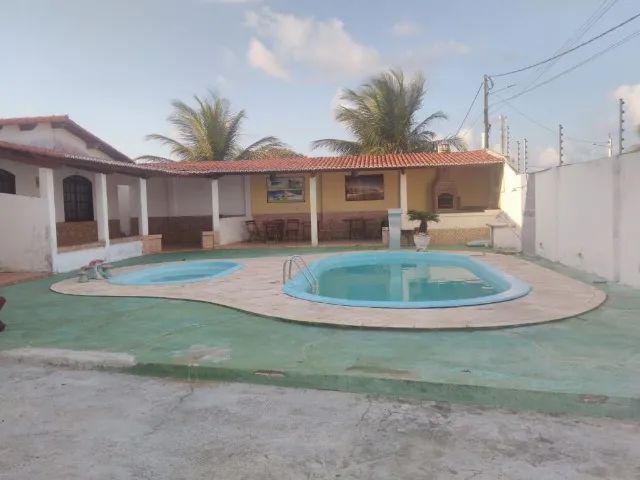 Vende-se este belo imóvel com 02 casas, piscina e churrasqueira