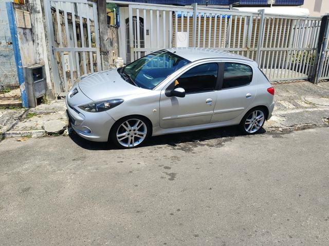 PEUGEOT 207 1.4 ( CUSTOMIZADO) veja a descrição - Foto 14