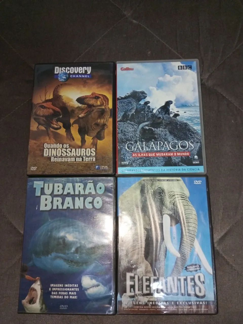 4 DVDs Quando os Dinossauros Reinavam na Terra. - Galápagos. - Elefantes. - Tubarão Branco