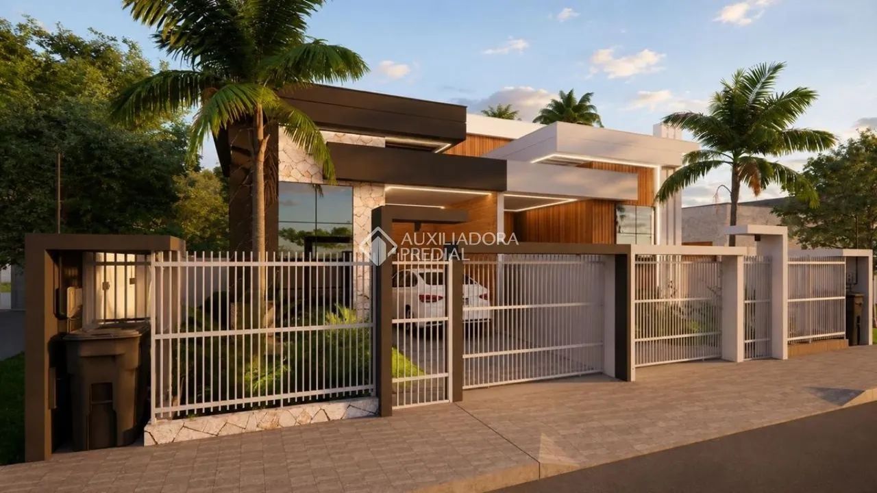 Casa individual com 3 quartos sendo 2 suítes no Carianos