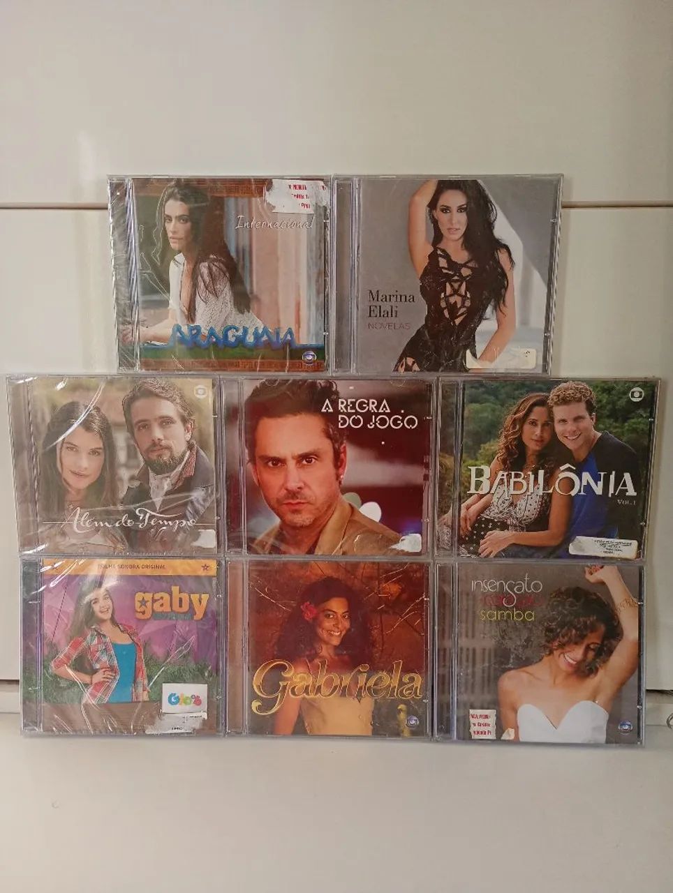 CDS DE TRILHAS DE NOVELAS LACRADOS (LER DESCRIÇÃO)