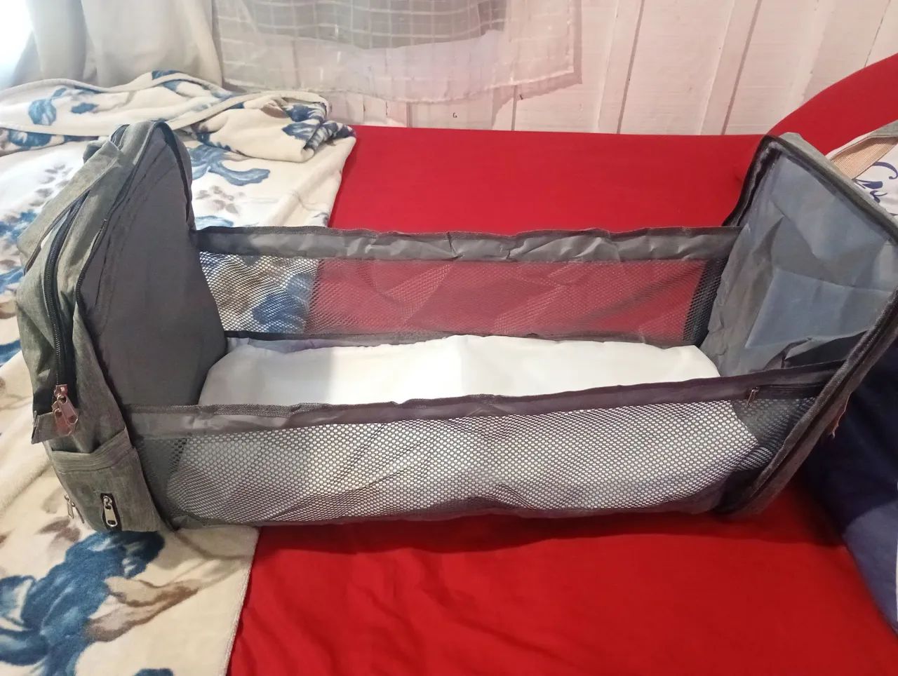 Vendo bolsa vira berço nova  - Foto 4
