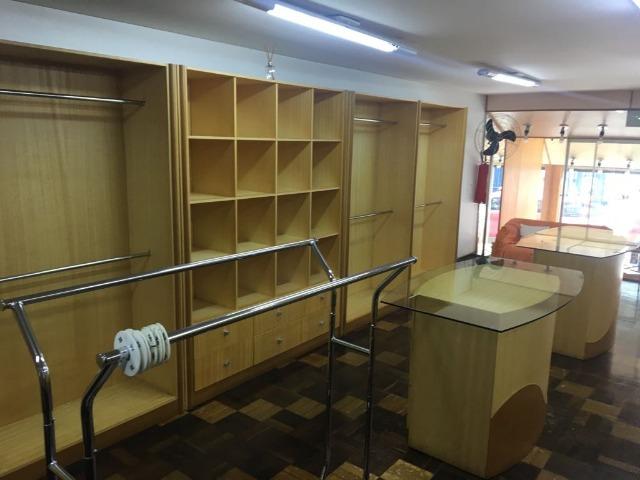 Móveis de marcenaria para loja de confecções em marfim - Foto 4