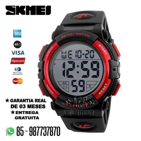 Relógio Skmei. Cores: Vermelho; e Preto. Entrega Grátis e Garantia. 50m : Piscina e Praia