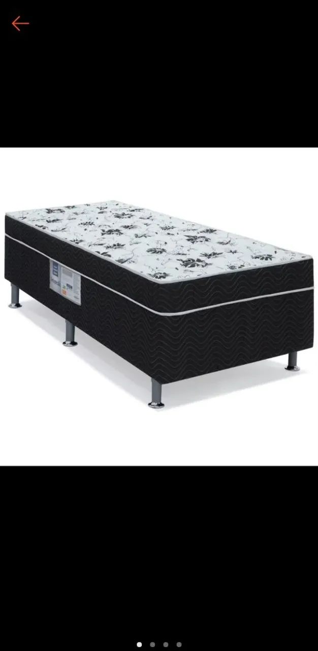 Single bed frame with mattress and base.