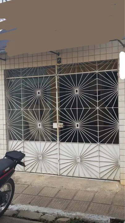 Portão de ferro com chapa