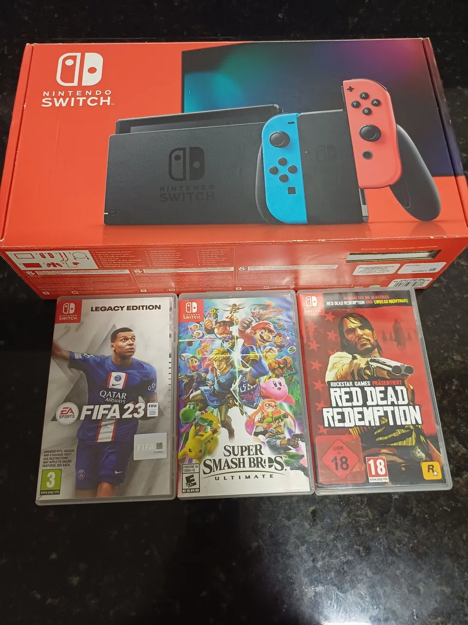 Troco nintendo switch + conta nintendo com jogos - Jogos de Vídeo