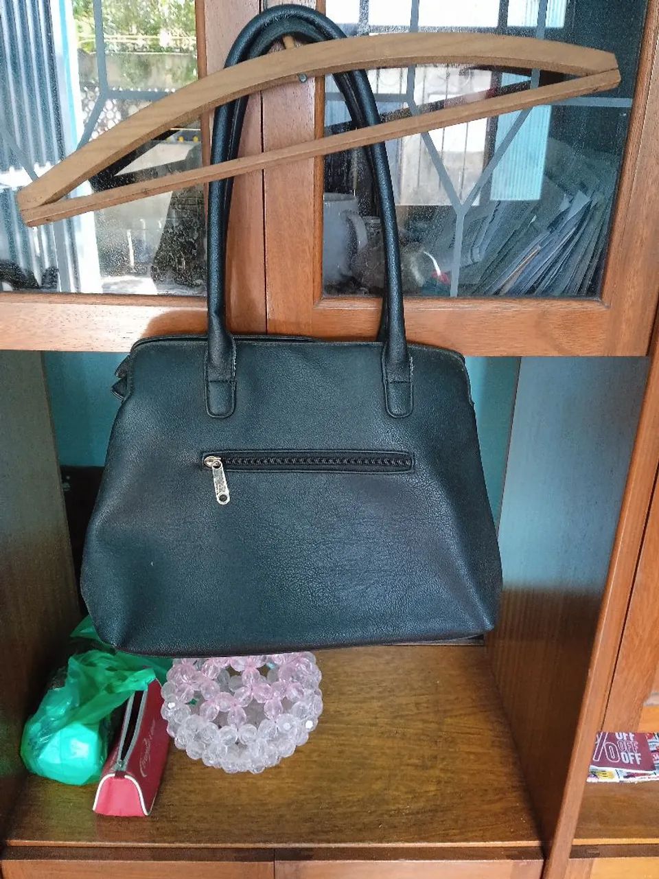 Bolsa , cor preta, em ótimas condições.