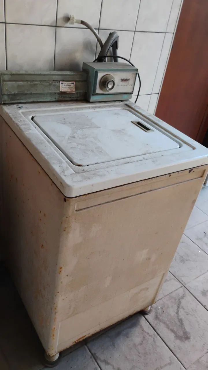 Máquina de lavar antiga.
