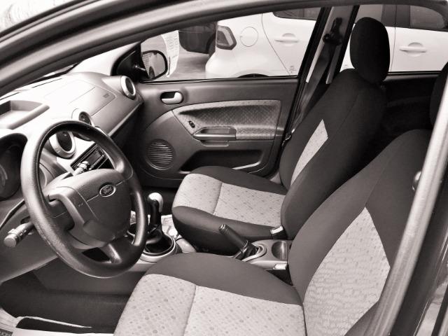 Fiesta se 1.0 com Air Bag e Abs fabrica 56 mil km igual a zero - Foto 5
