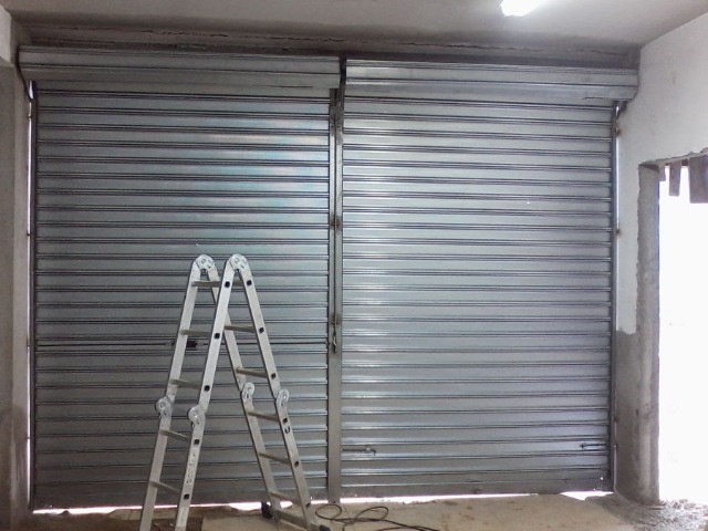 Portas de aço  de enrolar  manual ou automática reparação e fabricação - Foto 2