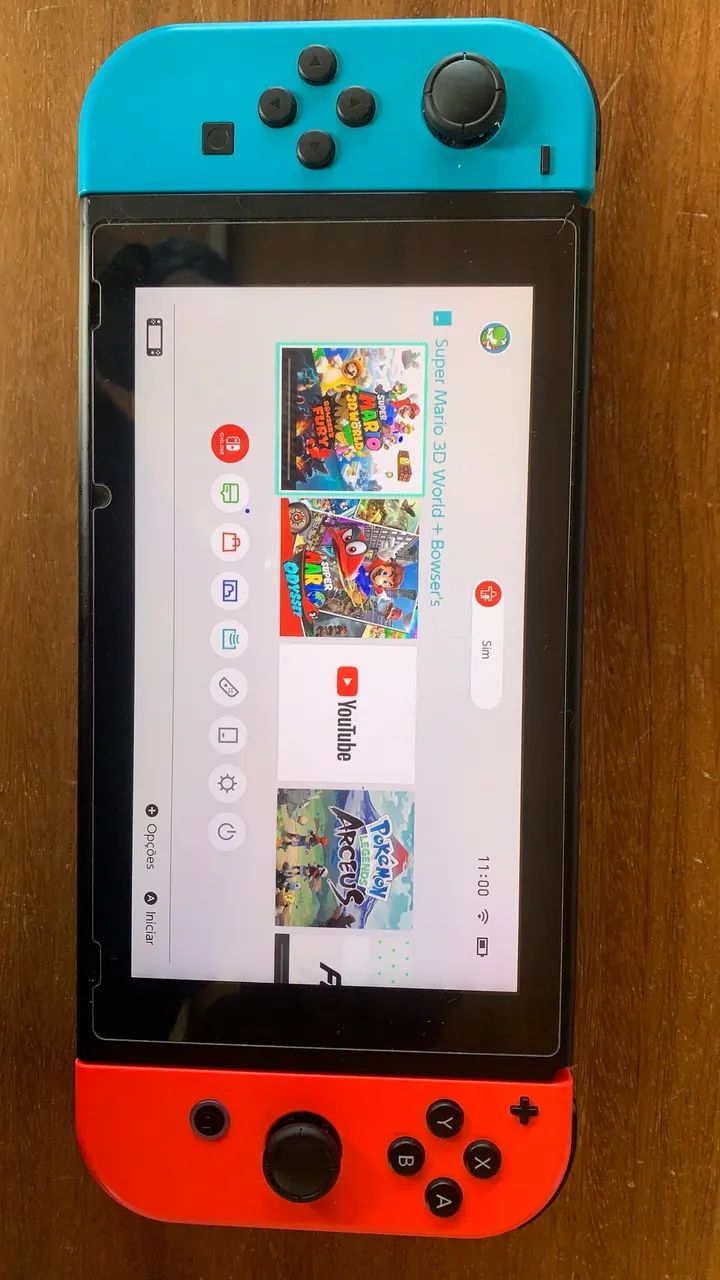 Nintendo Switch na caixa com 6 jogos e mais online - Consoles de