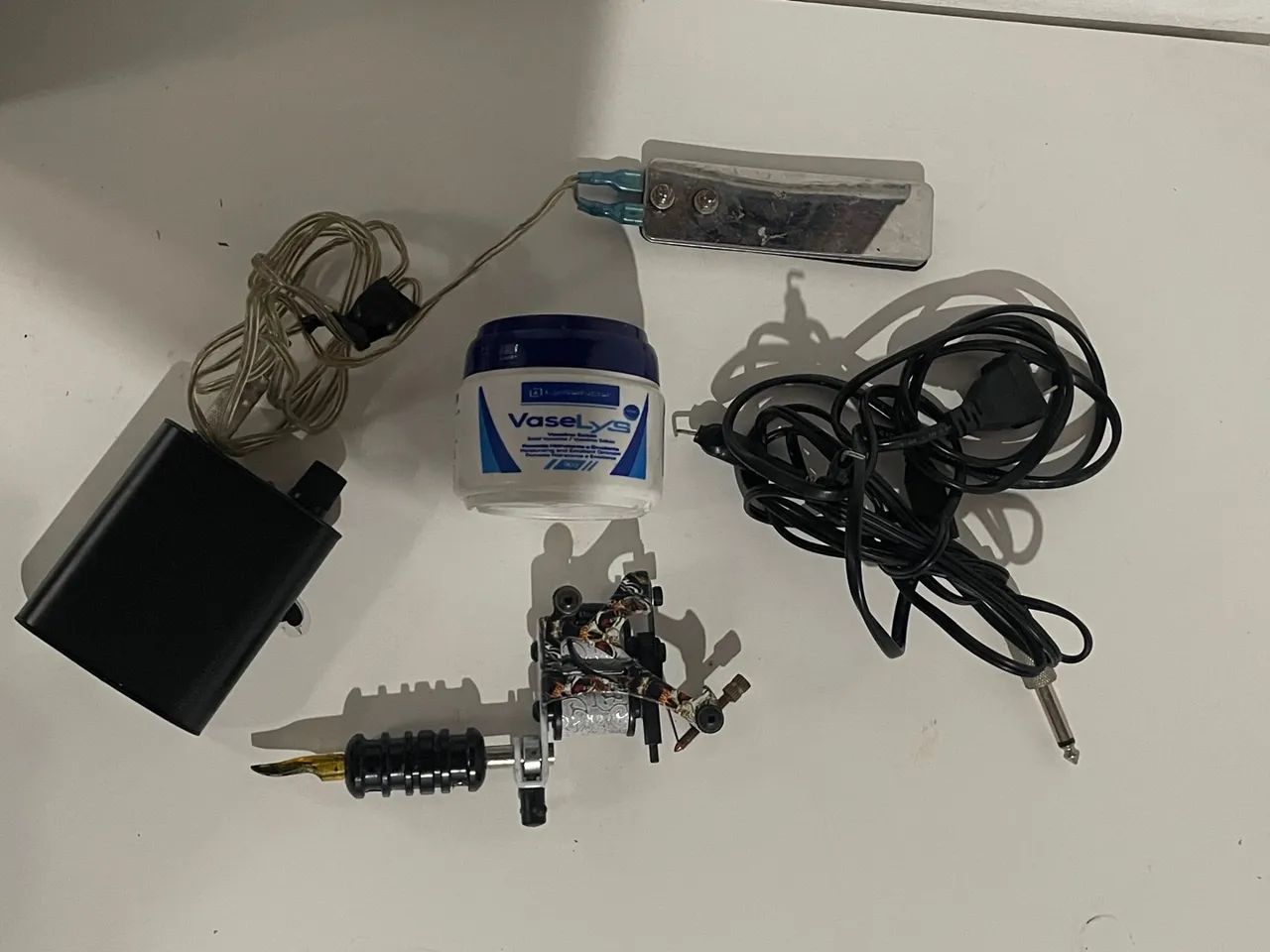Kit Tatuador com máquina vender logo