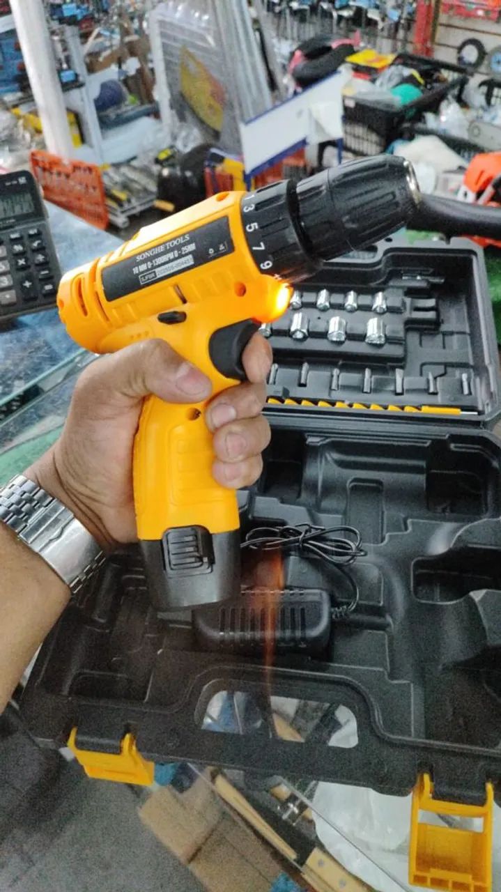 Furadeira/Parafusadeira 12V 2 bateria com acessórios - Foto 2