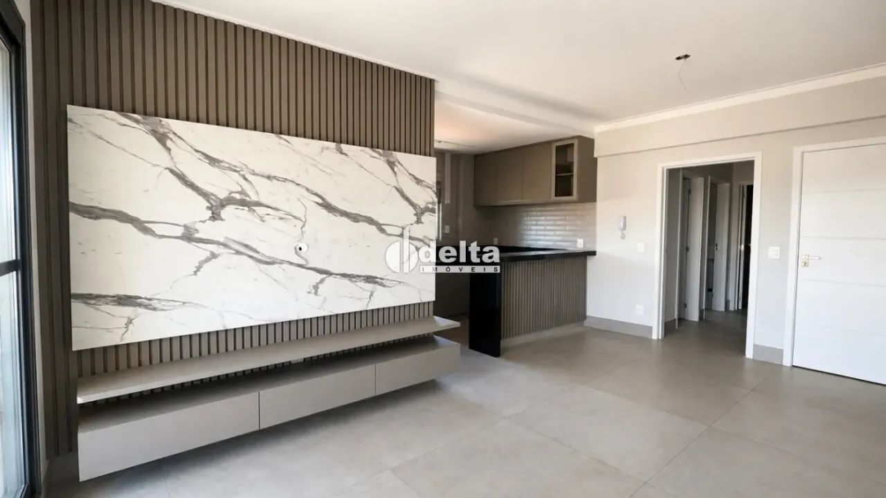 Apartamento com 1 quarto sendo suíte disponível para venda no bairro Osvaldo Rezende em Ub 2