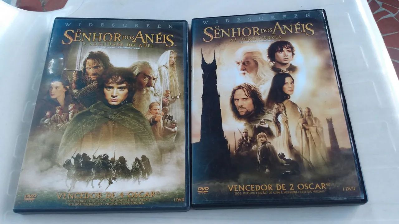 DVD original o senhor dos anéis vol. 1 e2 . 