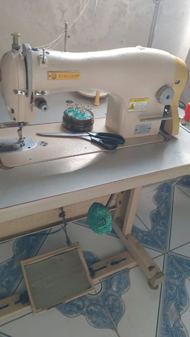 Maquina de costura singer