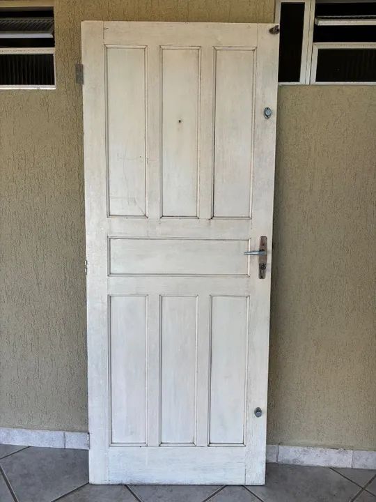 Porta maciça de angelim e portas com vidros para varanda - Foto 6