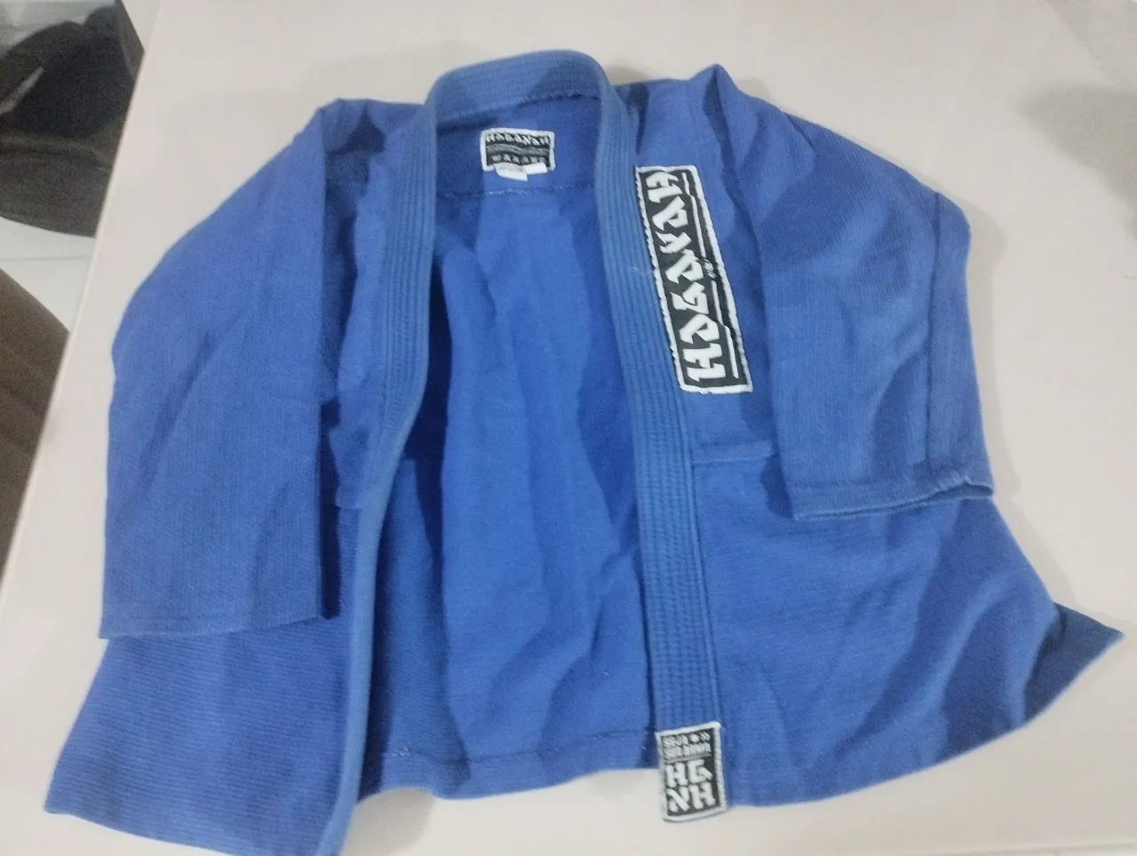 Kimono infantil traçado de Jiu-Jitsu Azul
