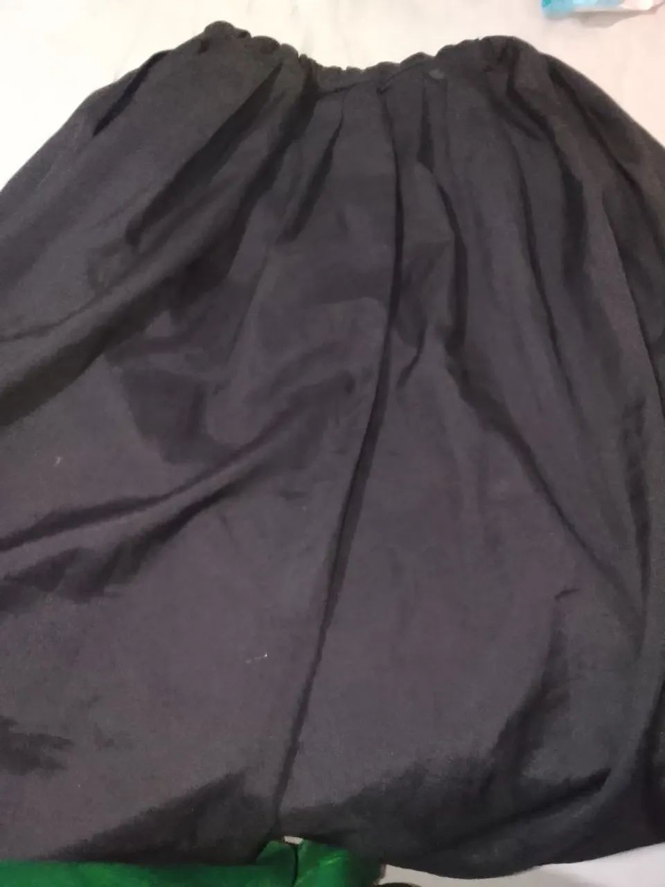 Saia preta, umbanda e candomblé.