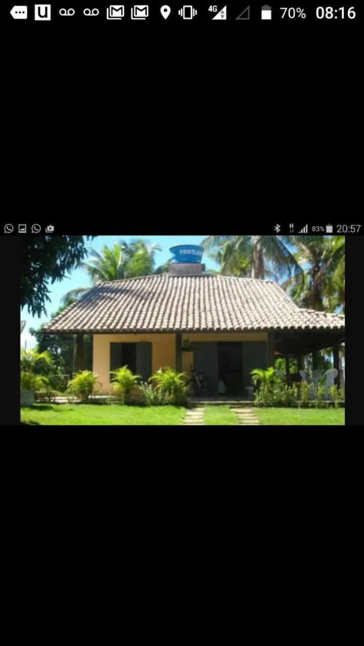 Casa com piscina semi Olímpica 