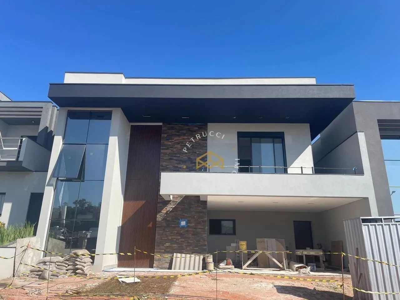 Casa com 4 dormitórios à venda, 254 m² por R$ 2.450.000,00 - Condomínio Villagio Di Montal