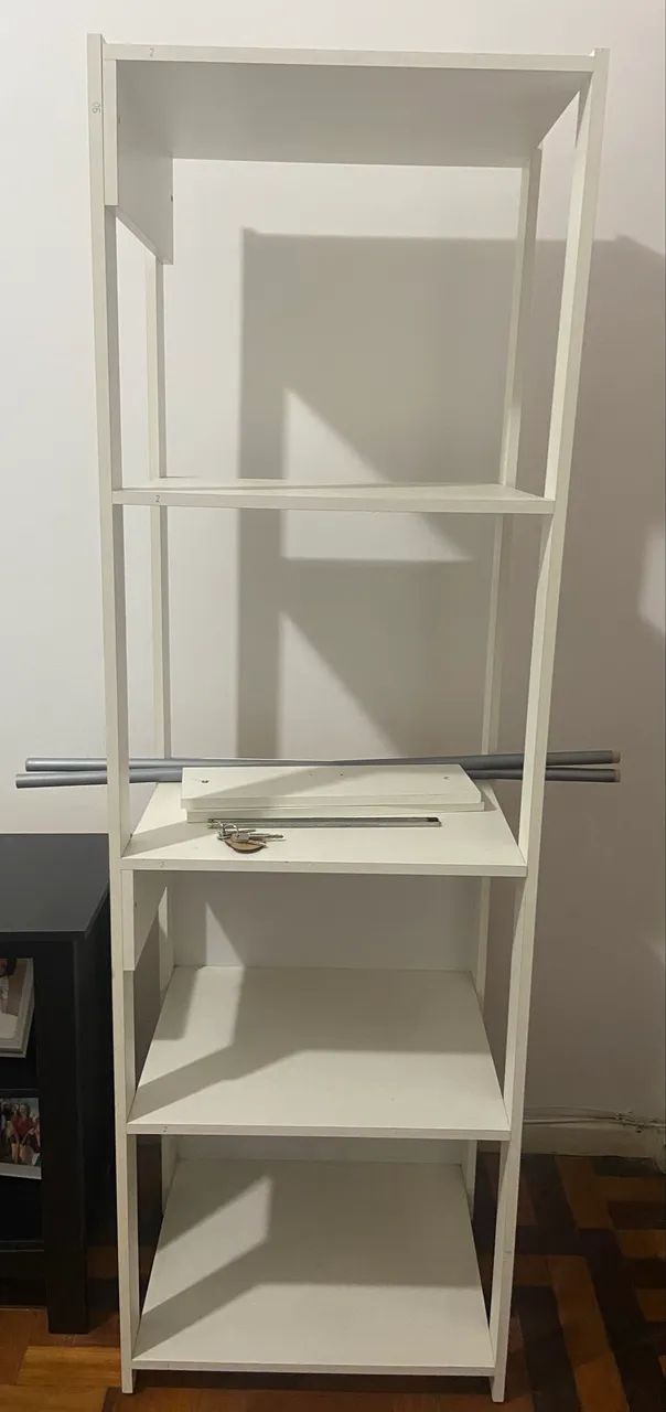 4-Tier Shelf Unit Serving as a Closet