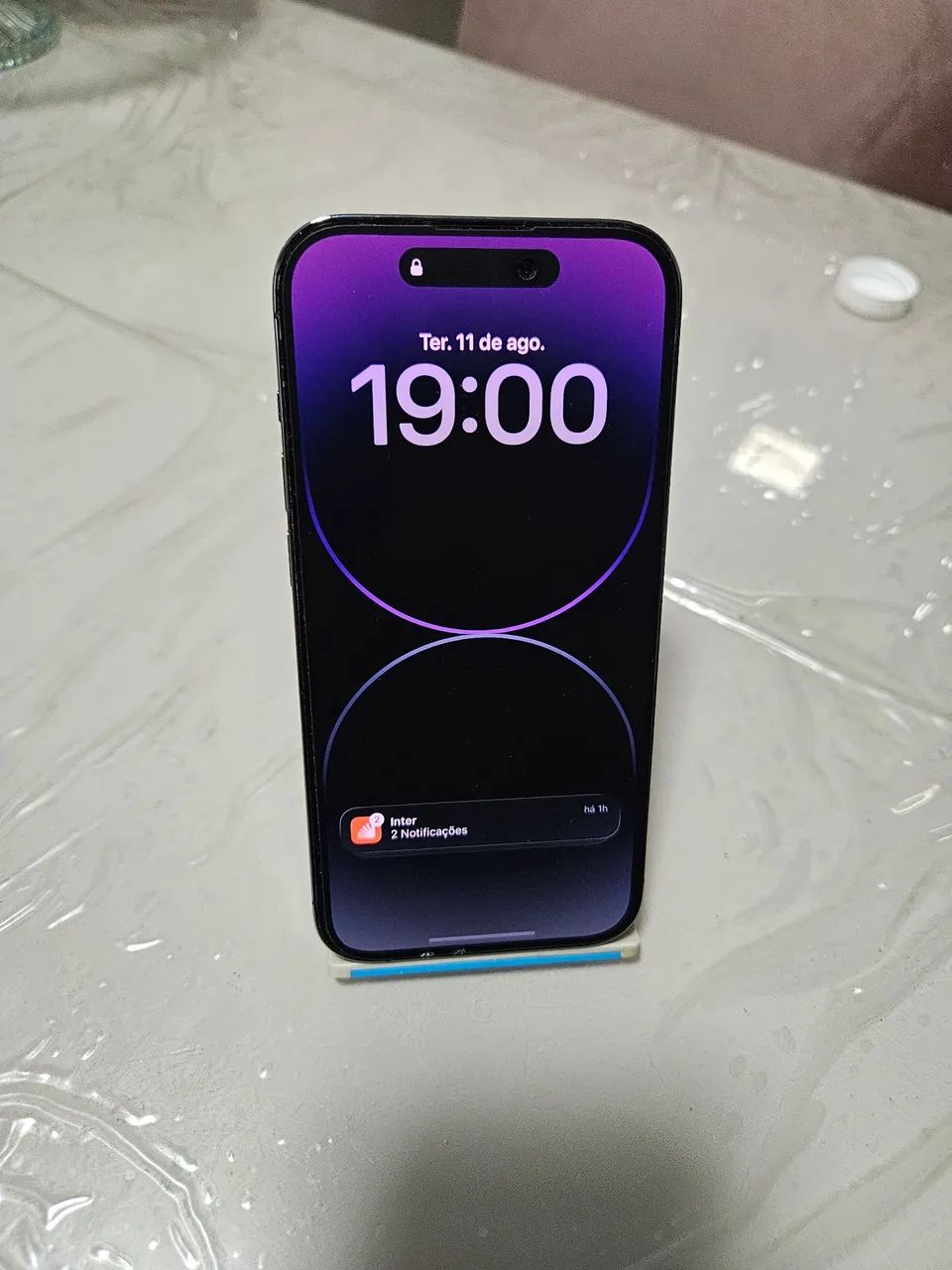 Vendo iphone 14 pro, na cor roxo, 128 gb,com saúde da bateria de 77%