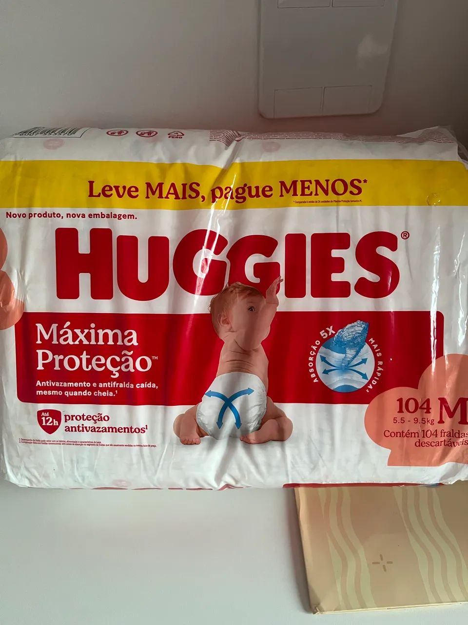 Fralda Huggies M 