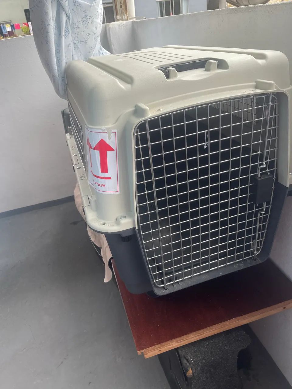 Caixa transportadora de cães