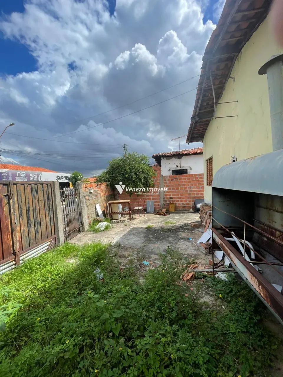 Terreno com casa construída próximo à Praça do Dirceu I  Itararé - Foto 3