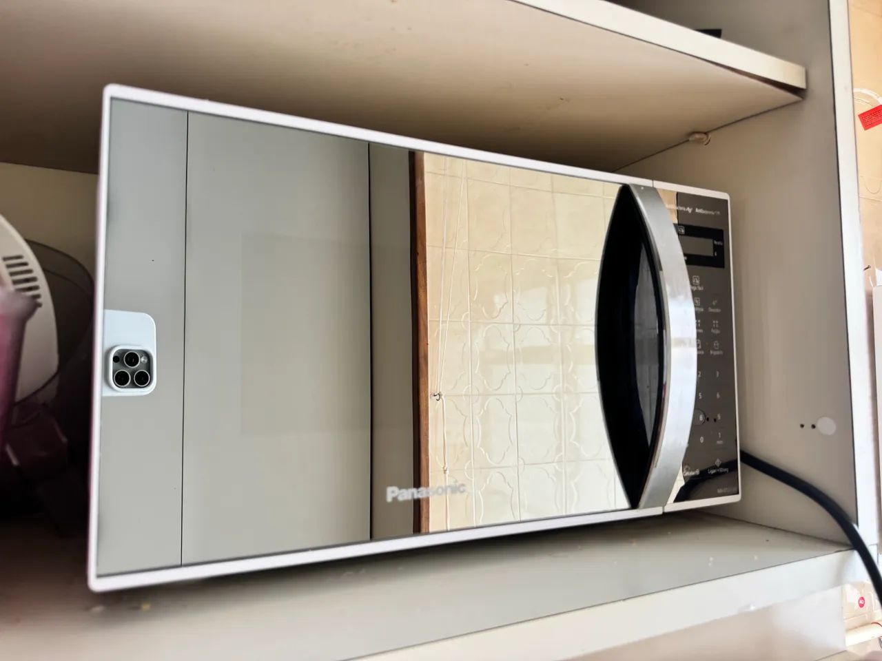 Microondas Panasonic espelhado 