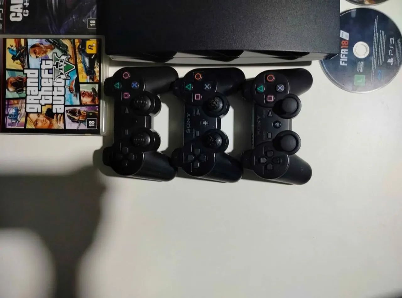 PS3 SLIM COM 5 JOGOS - Foto 2