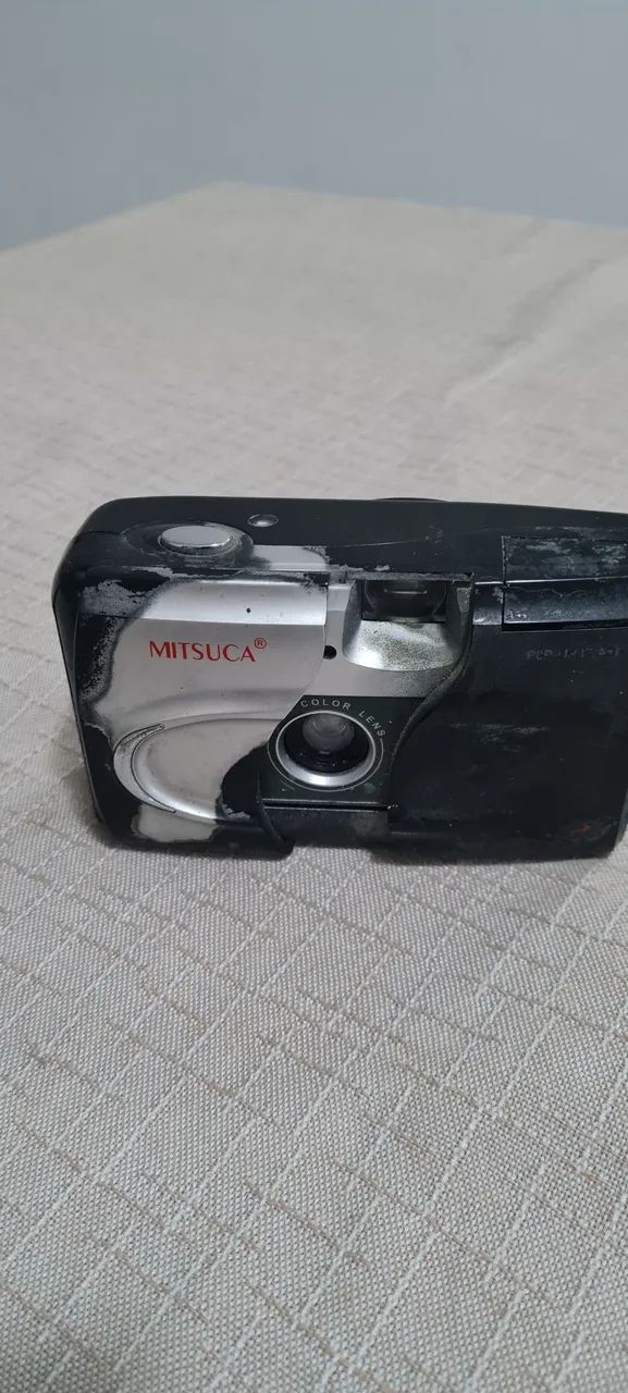 Yashica MD-135 + Pentax 1QZoom 80-E + Nikon Coolpix L100 + Mitsuca