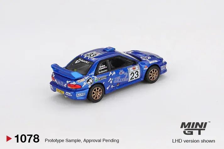 MINI GT Subaru Impreza WRC99 2000 # 23  1078 escala 1/64 - Foto 2