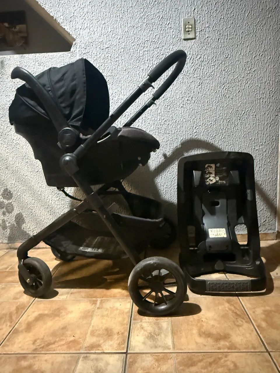 Carrimbo de bebê e bebê conforto com base