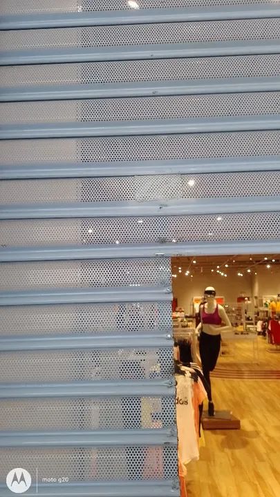 Regulagem e manutenção geral em porta de enrolar automática  - Foto 4