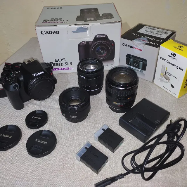 Canon SL3 + 3 Lentes + 2 Baterias e Kit de Limpeza Greika (50mm, 28-105mm e 18-55mm)