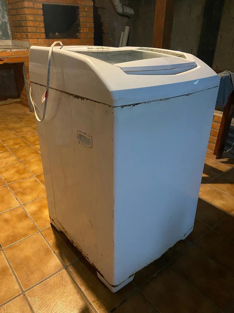 Máquina de lavar com defeito