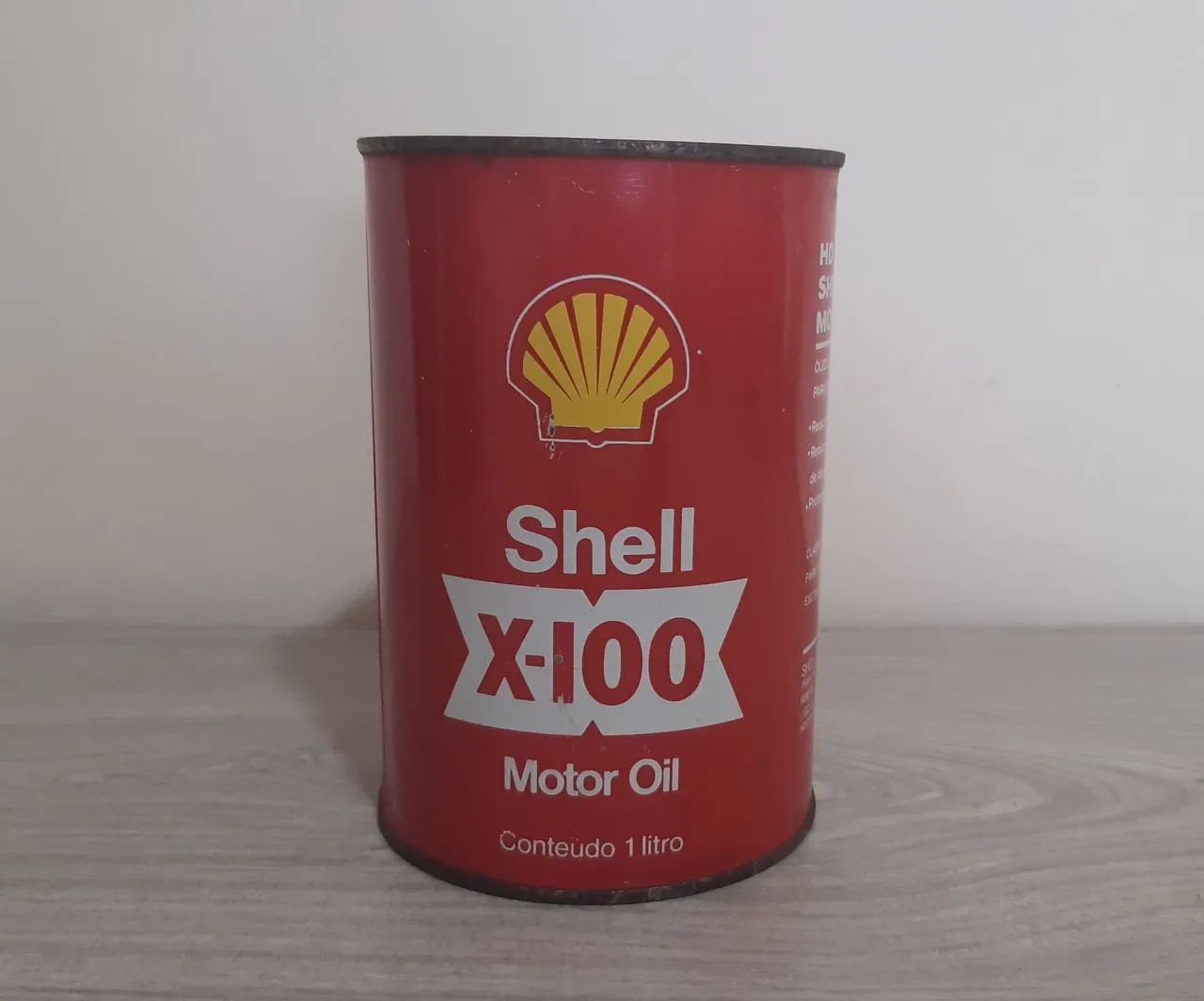 Antiga Lata Shell X-100