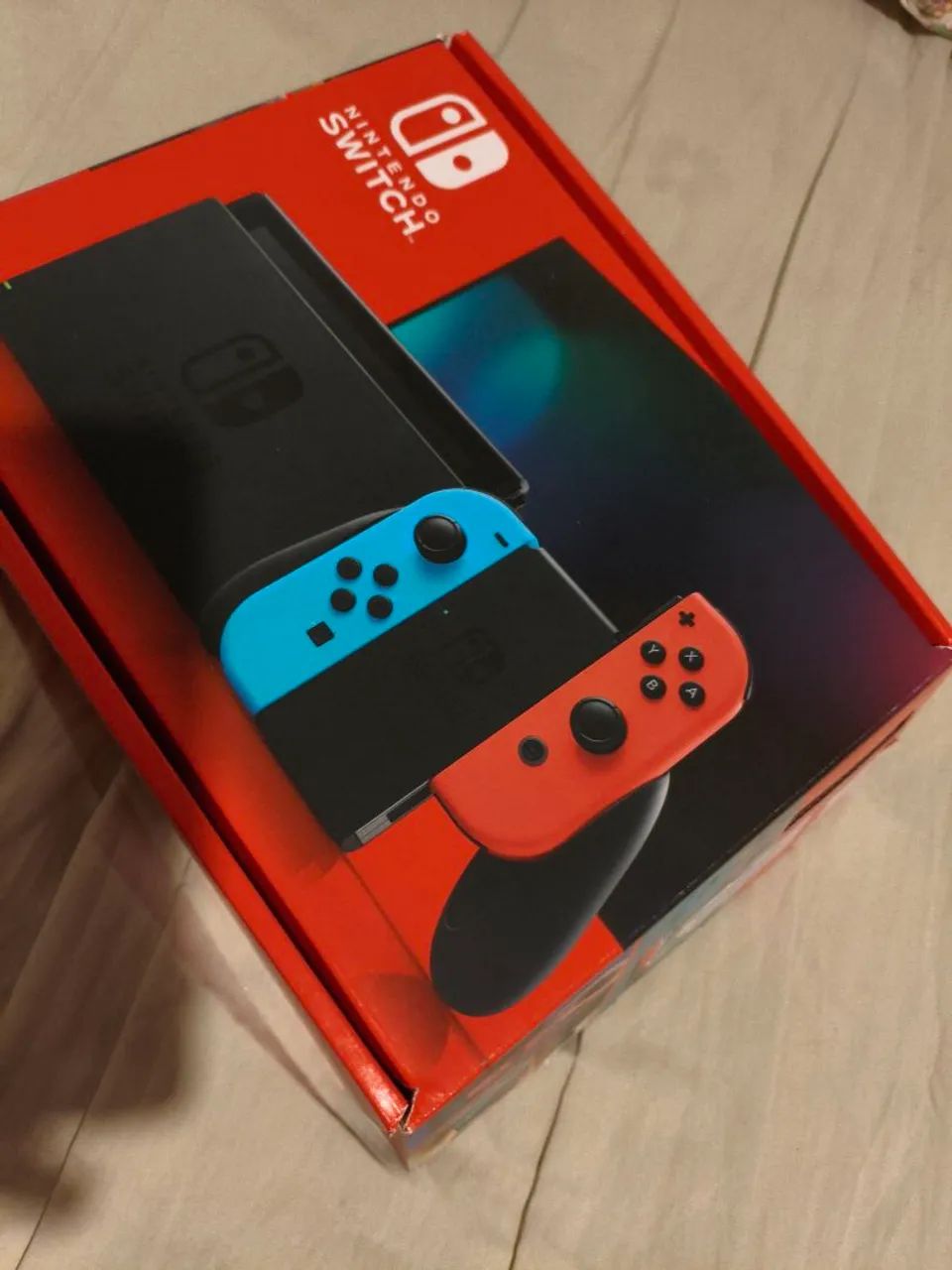 Nintendo Switch V2 + Par Extra de Joy-cons + charging grip extra, com caixa e sd 256gb - Foto 2