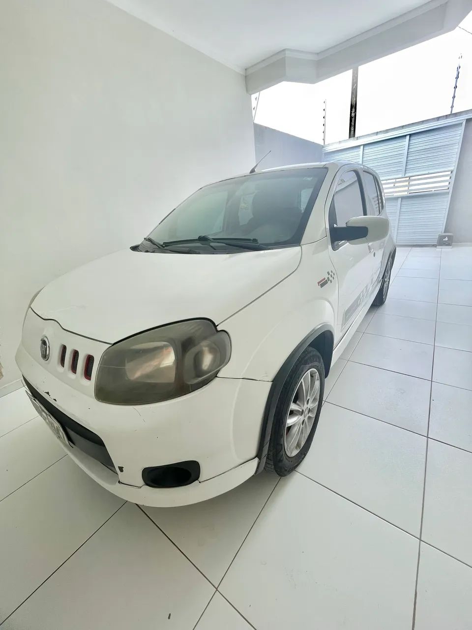 Fiat Uno Sporting 1.4 EVO Fire Flex 8V 4P 2012 - Foto 3